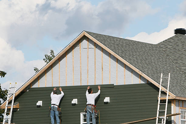 Professional Siding Installation technician working in Honey Grove, TX
